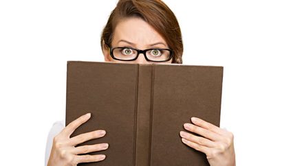 hiding behind a book